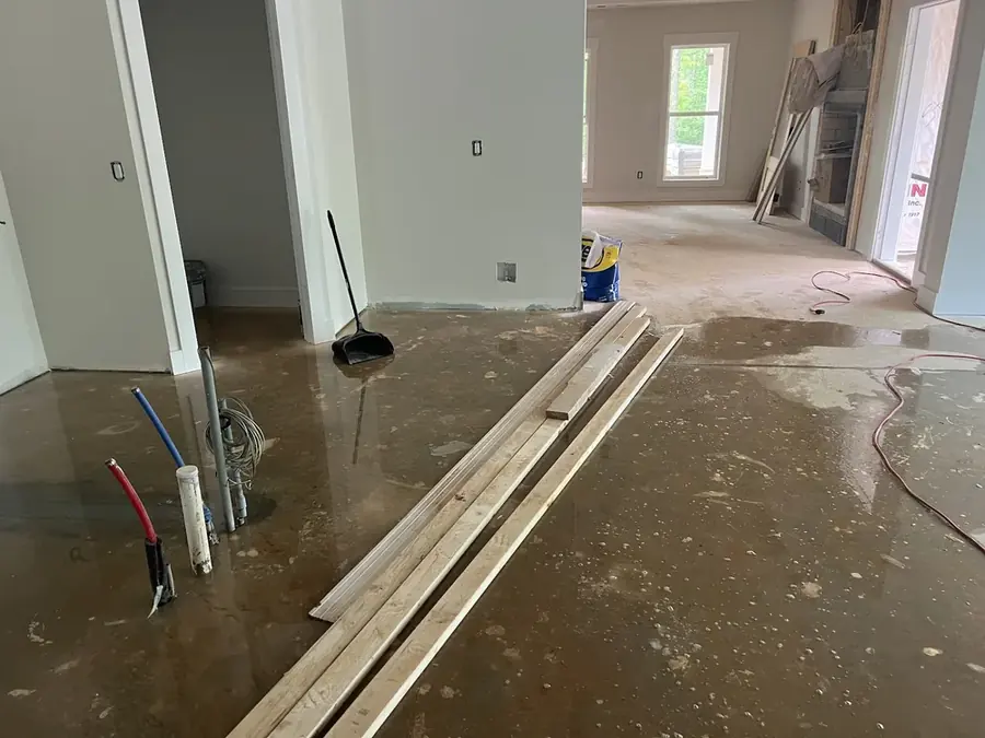 Burst water supply line spraying inside an Easley, SC home